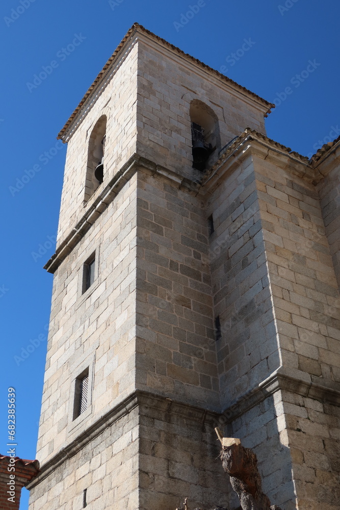 Church of the Assumption, Cadalso de los Vidrios, Madrid, Spain, November 18, 2023: Tower of the Parish Church of the Assumption (16th century). Cadalso de los Vidrios, Madrid, Spain