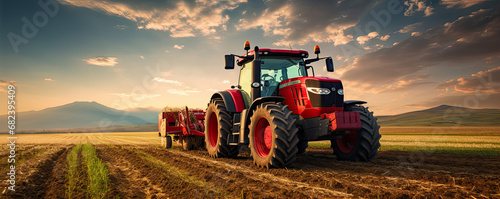 Obraz na płótnie The tractor works the soil in the field with amazing background w salonie