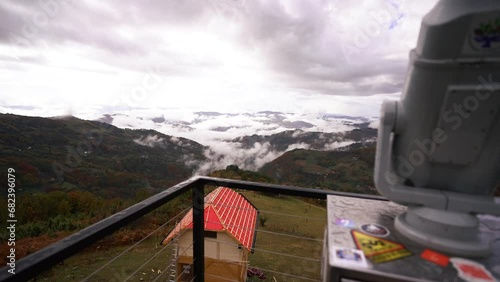 Binoculars telescope on observation deck for tourist. Travel, tourism. Nature landscape in serbian viewpoint. Weather after rain. High quality 4k footage