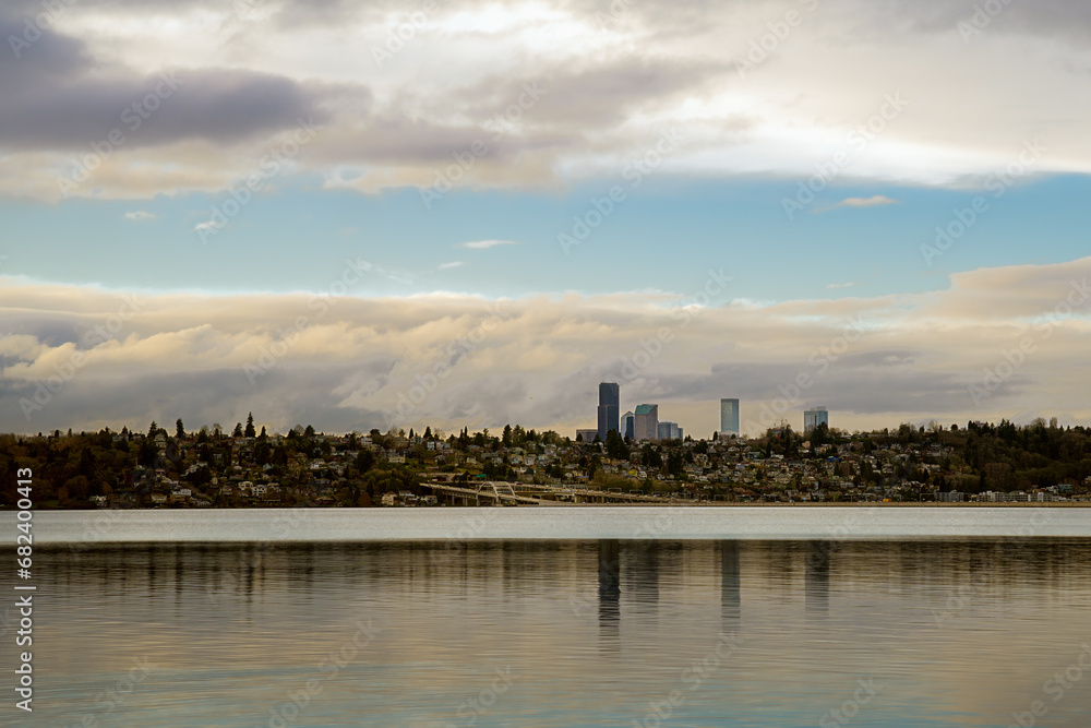 2021-02-19 LAKE WASHINGTON AND SEATTLE SKYLINE FROM MERCER ISLAND WASHINGTONWITH A REFLECTION IN THE LAKE AND A NICE SKY