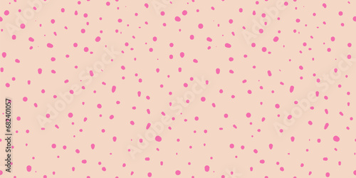 Vector seamless pattern with small hand drawn pink chaotic dots, spots on beige background. Trendy abstract minimalist funky spotted texture. Abstract spray grunge texture. Modern hot pink pattern