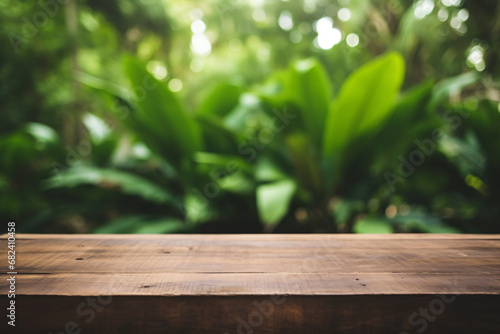 blank Wooden counter table in front of greenery plant forest background,organic product mockup