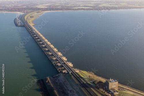 Aerial view Dutch Haringvliet dam with motorway in wintertime