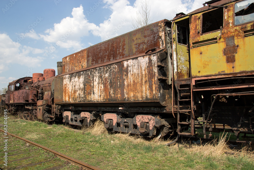 Fototapeta premium Old rusty locomotives and cars