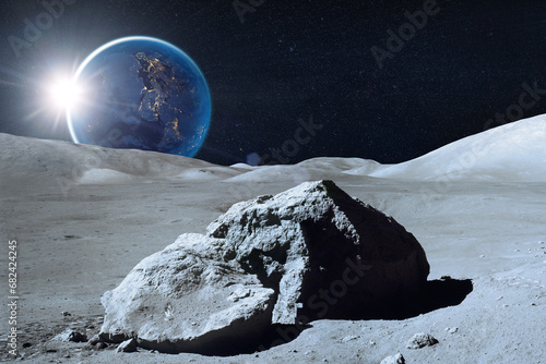 Fototapeta Naklejka Na Ścianę i Meble -  Moon surface in deep space. Moon and Earth at night. Elements of this image furnished by NASA.