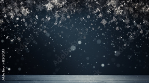 Snowflakes falling on black background photo
