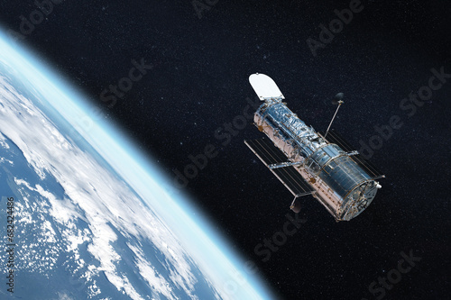 The Hubble space telescope on orbit of Earth planet. Space observatory research. Elements of this image furnished by NASA.