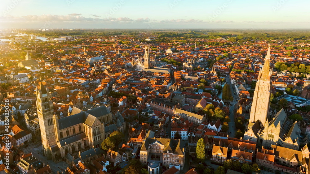 Naklejka premium Aerial of Belfry of Bruges is a medieval bell tower Bruges Belgium. 4k