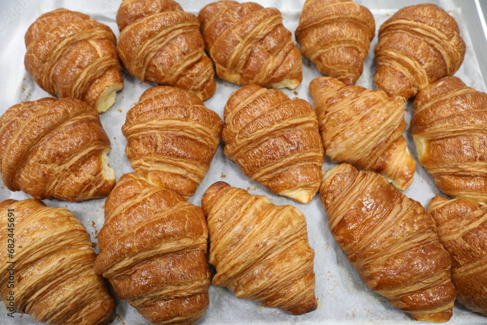 Baking croissants in a small bakery Baking croissants in a small bakery