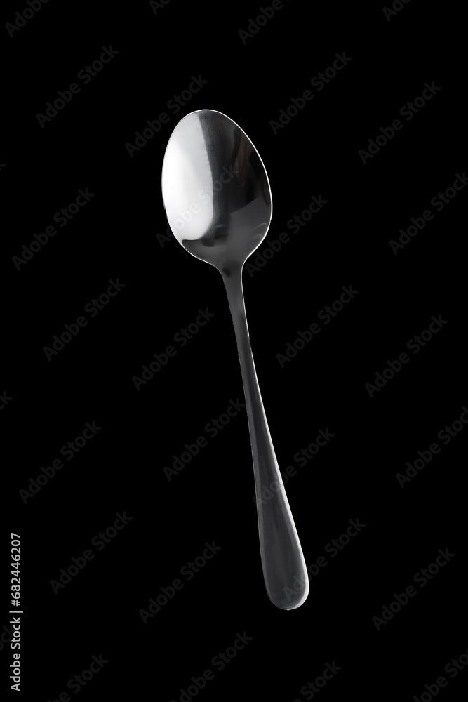 Coffee Spoon stainless steel isolated on black background Coffee Spoon stainless steel isolated on black background
