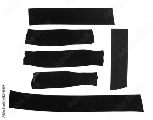 Pieces of black electrical tape isolated on a white background. photo