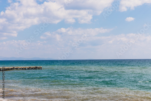 Black Sea beach on the embankment in Alushta, Crimea © dadamira