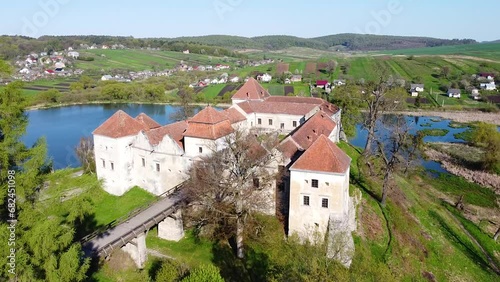 View of the old Renaissance castle near a lake 