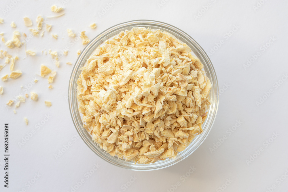 Dried Minced Ginger in a Bowl Dried Minced Ginger in a Bowl