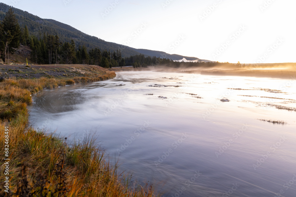 Sunrise over river in Yellowstone National Park