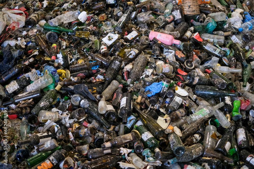 hundreds of glass bottles waiting to be recycled hundreds of glass bottles waiting to be recycled