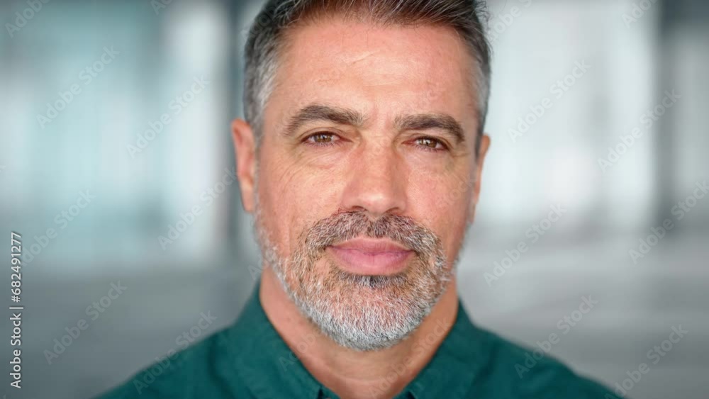 Confident older bank manager or investor, mid adult businessman boss, professional Indian business leader looking at camera. Smiling mature business man in office, close up portrait. Confident older bank manager or investor, mid adult businessman boss, professional Indian business leader looking at camera. Smiling mature business man in office, close up portrait.