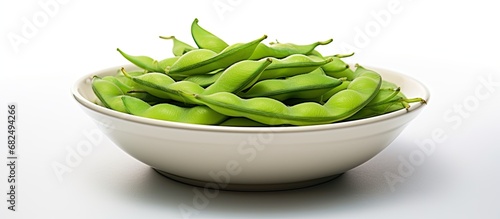Wallpaper Mural In the isolated white background, a plate of vibrant green edamame beans exudes freshness and health, reminiscent of the natural and nutritious qualities found in Japanese cuisine. Its soy-based Torontodigital.ca