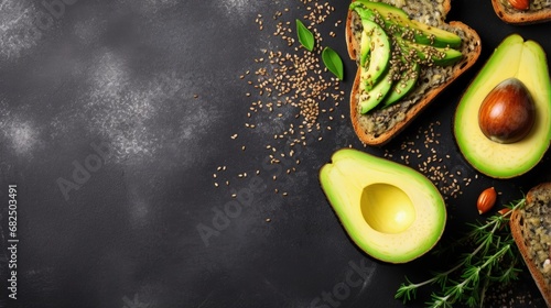 Healthy avocado toasts for breakfast or lunch with rye bread, sliced avocado, pumpkin seeds, salt and pepper. Vegetarian food. Plant-based diet. Clean eating. Top view. Copy space, photo