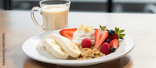 The white chocolate dessert on the plate at the cafe was a delicious and indulgent treat; however, for those seeking a healthier breakfast option, they could choose a natural fruit salad with yogurt