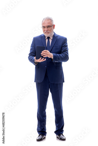 Old businessman holding book isolated on white