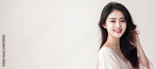 Beautiful asian woman with long hair and skin care concept. Space for text or product display.