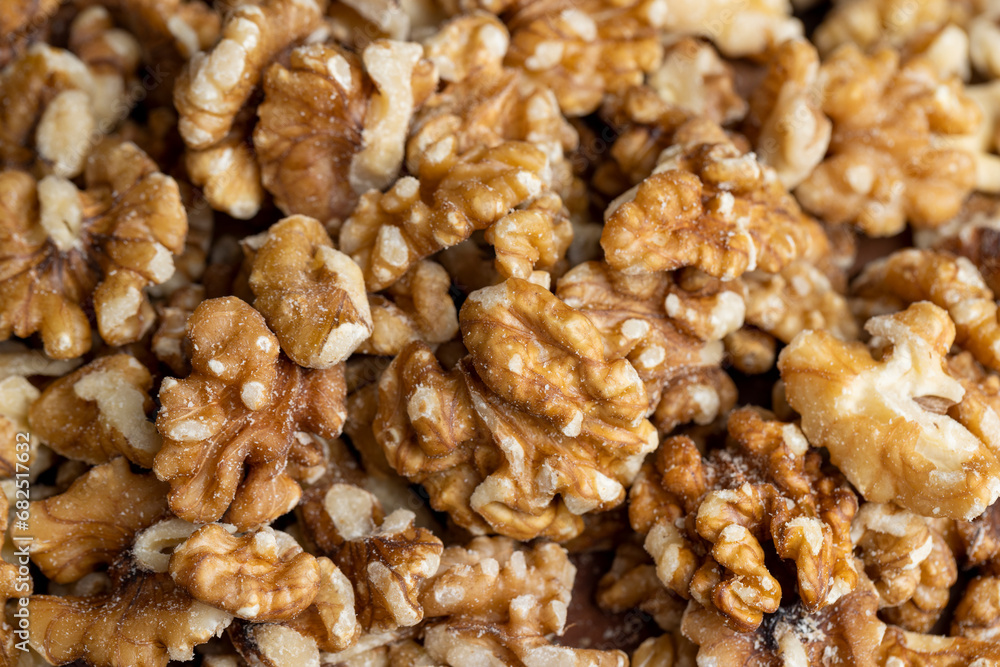 Walnut kernel on the kitchen table during cooking Walnut kernel on the kitchen table during cooking