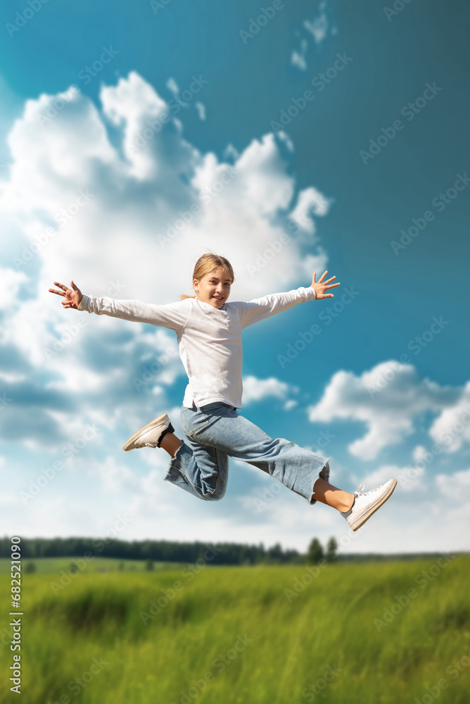 Blonde Caucasian girl jumping for joy in the middle of a field. Happy girl due to vacation, her birthday, or a sales discount period Blonde Caucasian girl jumping for joy in the middle of a field. Happy girl due to vacation, her birthday, or a sales discount period