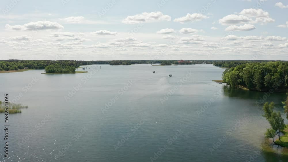 Birds-eye view of Trakai Castle nestled by Lake Galve Birds-eye view of Trakai Castle nestled by Lake Galve