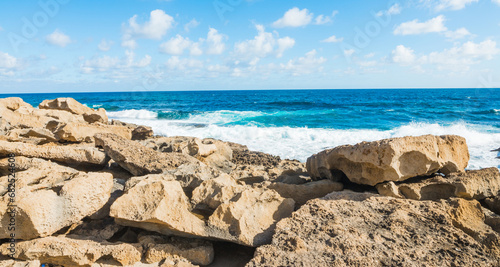 Yellow rocks by the shore in Sardinia