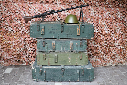 Soviet army ammunition stack of green crates with russian names of ammo type and category number photo