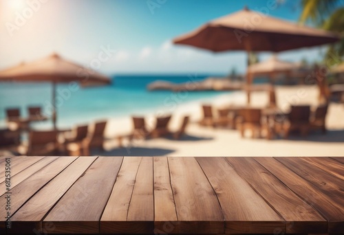 Wood table top on blur beach cafes background - can be used for display or montage your products