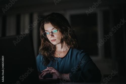 Woman strategizing in an office, discussing market trends and competitive analysis for business growth. Networking for innovative product development and revenue growth.