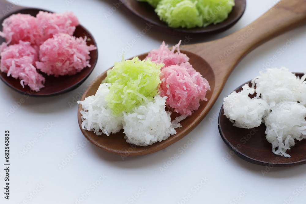 Sweet coconut balls, crispy coconut candies (Maprao Gaew). Thai traditional dessert Sweet coconut balls, crispy coconut candies (Maprao Gaew). Thai traditional dessert