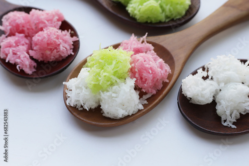 Sweet coconut balls, crispy coconut candies (Maprao Gaew). Thai traditional dessert