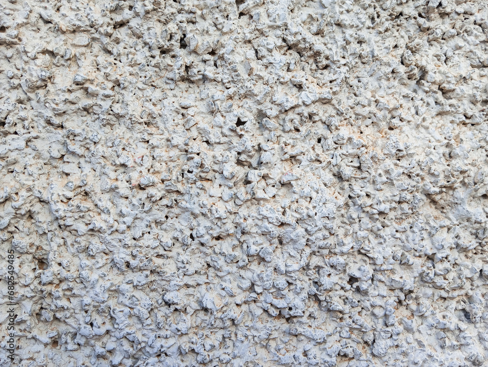 Abstract gray rough wall textured background with copy space.