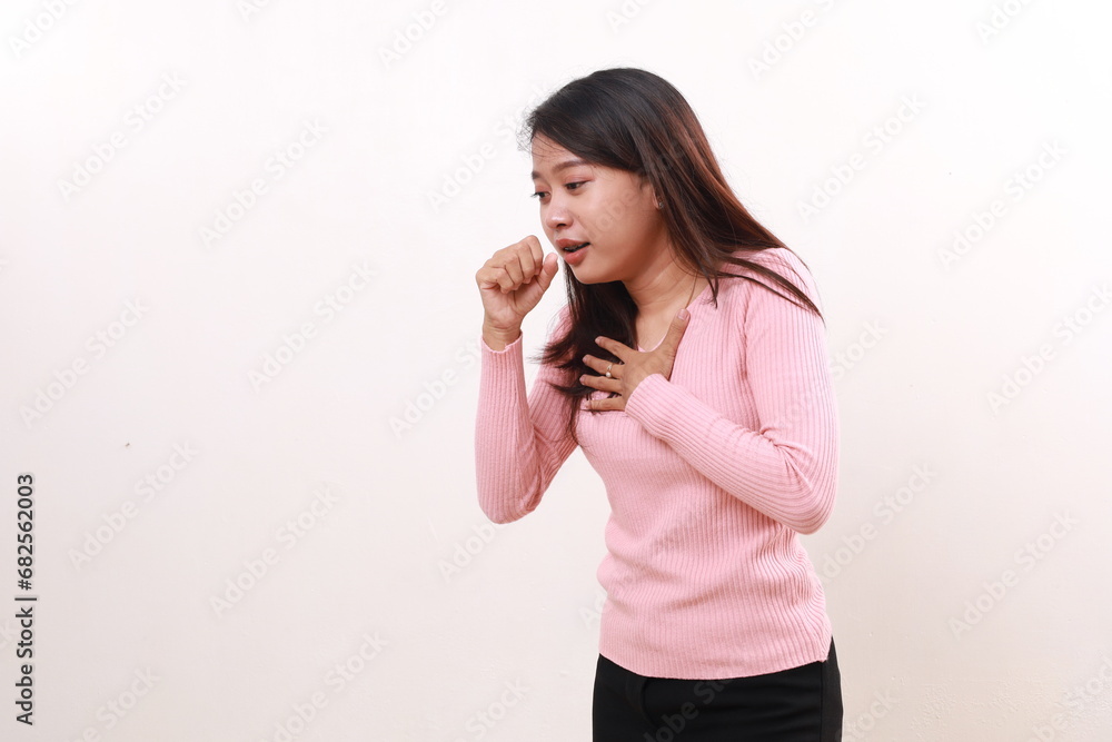 Young asian woman suffering from cough and feeling bad. Isolated on white background Young asian woman suffering from cough and feeling bad. Isolated on white background