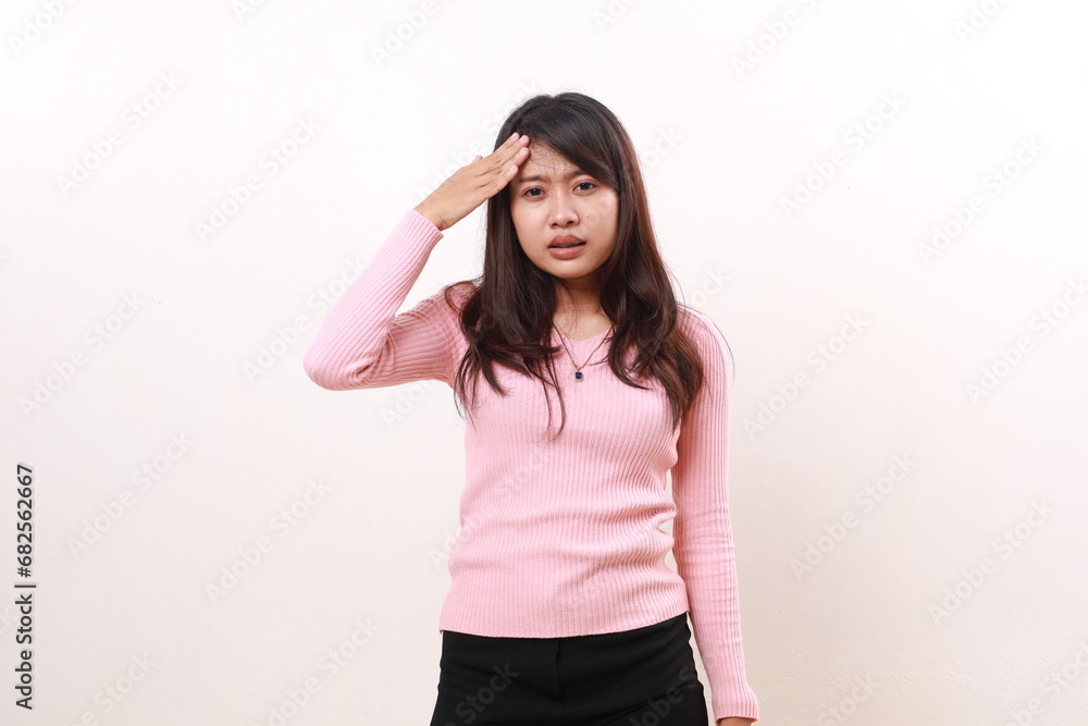Young asian girl suffering from headache. Hand holds head. Isolated on white Young asian girl suffering from headache. Hand holds head. Isolated on white