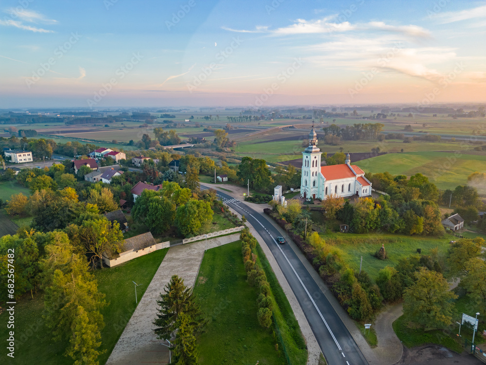 Aerial autumn view at church  in Chelmno on the Ner River, a village in Poland