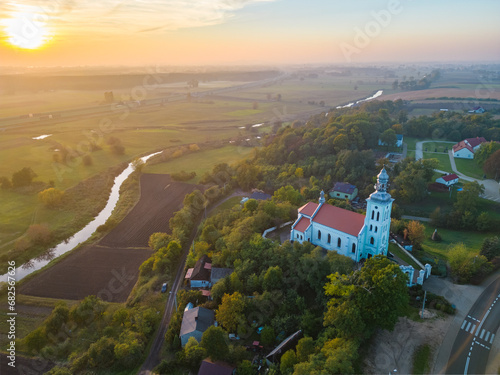 Aerial autumn view at church in Chelmno on the Ner River, a village in Poland photo