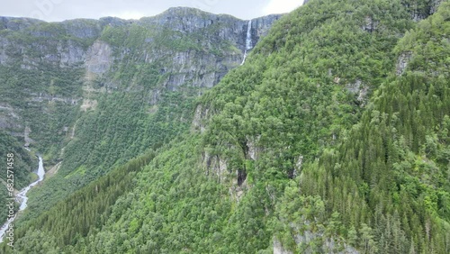 Waterfall in Norway's Fjord, unfolding aerial footage photo