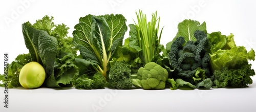 In the verdant embrace of nature  a vibrant medley of green leafy vegetables  their textured leaves brimming with health and color  were impeccably arranged on a white isolated background  enticing