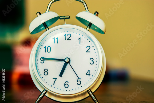 Retro alarm clock on table.