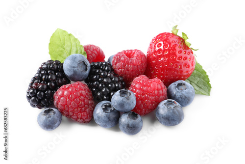 Many different ripe berries and mint leaves isolated on white
