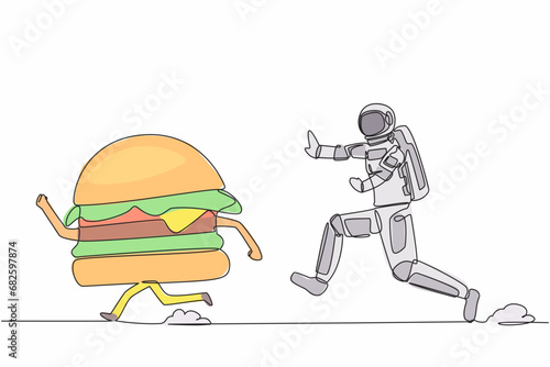Single continuous line drawing of young astronaut run chasing hamburger in moon surface. Food estate industry in outer space. Cosmonaut deep space concept. One line design vector graphic illustration