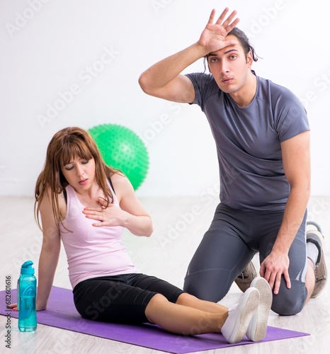 Young woman feeling bad during training in first aid concept