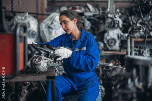 Car technician check engines, choose quality gear for precise repairs to ensure optimal performance
