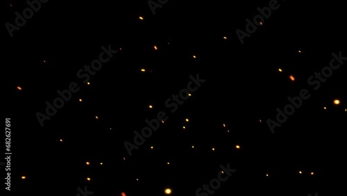 Fire sparks rising up with transparent alpha channel can be used for overlay for your project. 4K 3D animation of fiery orange glowing flying ember burning ash particles.