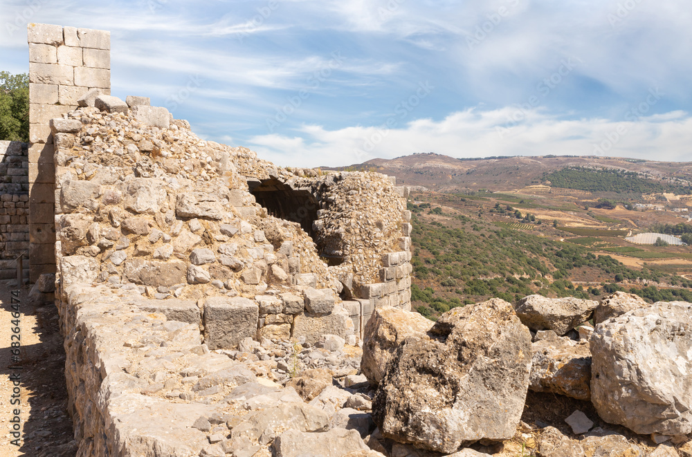 View  from fortress wall of dilapidated round tower in the medieval fortress of Nimrod - Qalaat al-Subeiba, located near the border with Syria and Lebanon on the Golan Heights, in northern Israel