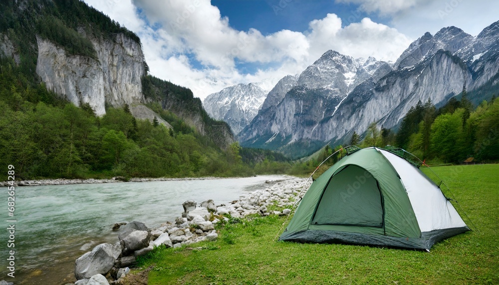 Amazing mountain landscape: Tent on the shore. small river meanders through green valley. sunny day perfect for hiking and exploring nature. travel and concept. blurred foreground. ai generated. 